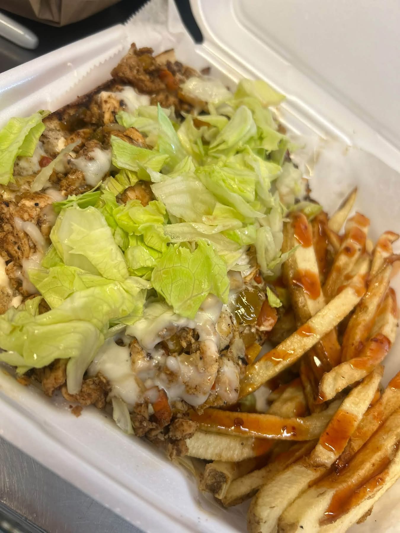 Philly sandwich with fries